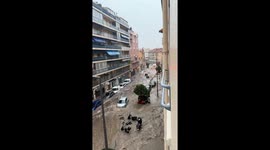 Floodwaters rush through streets in Cannes, France
