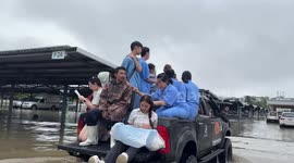 Nurses toil in flood-stricken hospital in Thailand