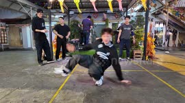 Breakdancers give a free performance at the Kalare Food Centre in Chiang Mai, Thailand