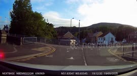 Speedy Driver Nearly Hits Crossing Wheelchair