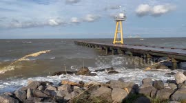 Hurricane Helene churns up surf more the 250 miles away in Dauphin Island, Alabama. The hurricane is expected to make landfall on the Florida coast.