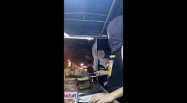 Roti pancake flies from street food stall during storm