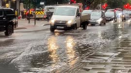 Waterlogged Euston Road in central London as more flood warnings are issued in England