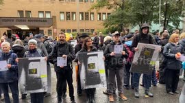 Hundreds of climate activists stage a protest exhibition outside London court