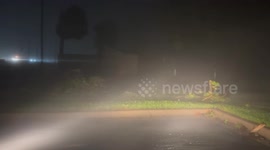 Flying tree branches during the eyewall of Hurricane Helene