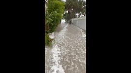 Insane footage of storm surge entering the roads