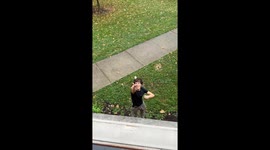 Guy throws table tennis ball into cup that on the upper level