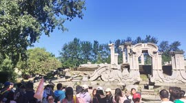 China: Tourists Visit The Old Summer Palace Ruins Park in Beijing