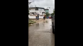 Flood waters surge through Acapulco, Mexico