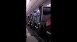 Airline Passenger Upset at Reclined Seat