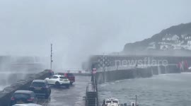 Watch as huge waves pound the sea walls in Cornwall as spectacular autumn storm hits
