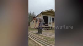 Man spends £10k transforming a static caravan into a log cabin in just four months