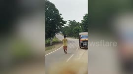 Wild rhino kills motorcycle rider on rural road in India