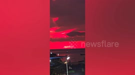 Shepherd's delight! Sky turns eerie deep red colour at sunset in Thailand