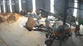 Loader truck overturns due to heavy sand load in Shanxi Province factory