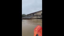 Neighborhood flooded after Hurricane Helene in Asheville, North Carolina