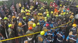 Firemen search Thai school bus wreckage as 'up to 25 pupils die' in fire