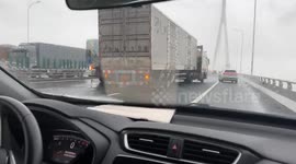 A Small Truck Prevents A Large One From Rollover