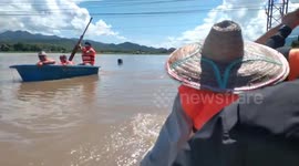 Rescue team's kayak capsizes during flood rescue