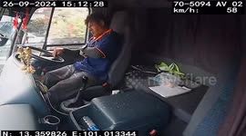 Trucker's cigarette break interrupted when chunk of metal flies through windscreen
