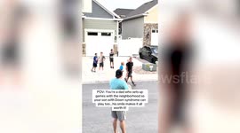 Neighbourhood come together to play ball games with lad with Down syndrome