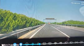 Car crashes into road barrier after overtaking on highway