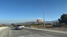 California forest fire looks like volcano, erupting, and smoke drifting over Los Angeles