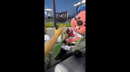 Crowd plays rock, paper, scissors with baseball mascot