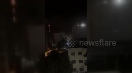 Lebanon: A building collapses in the southern suburb of Beirut after being bombed by the Israel air force