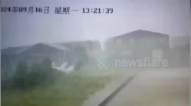 Typhoon picks up plane and dumps it in fishpond after destroying hanger