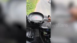 Trucker's epic set up - he cooks full lasagne from scratch on own dashboard