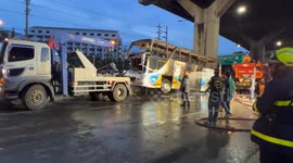 Thai bus fire wreckage removed from scene as police arrest driver