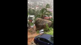Boulder crushes car in Acapulco, Mexico