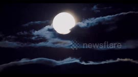 Spooky full moon rises over Magna, Utah