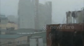 Typhoon's Unusual Landfall in Taiwan's Southwest Triggers Strong Winds, Grounded Flights, and Financial Market Closure