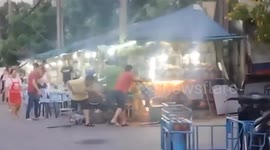 Street food vendors help control fire from burning stall