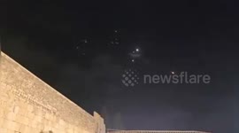 Missiles fired into Israel from Iran seen above Jerusalem