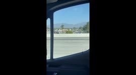Driver Lets His Foot Hang Loose on the Highway
