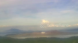 Taal Volcano's steam-driven explosion creates massive plume over crater