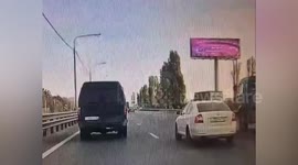 Russia: Minibus driver speeds up to stop other car cutting in front and flips over on roof