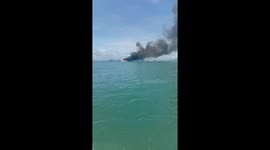 Yacht drops off 22 tourists then catches fire in Phuket, Thailand