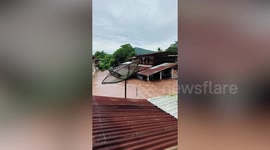 Residents stranded on roofs as flash floods return to northern Thailand