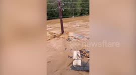 Shipping container crushed like a soda-can in North Carolina floods