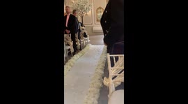 Adorable moment little boy pulls 10-month-old sister down aisle on parents' wedding day