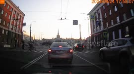 Russia: Driver Squeezes Between Cars And Almost Hits Pedestrian On Crosswalk