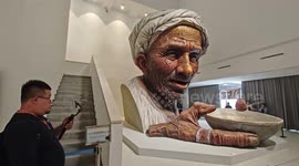 China: People Visit The Large-scale Sculpture
