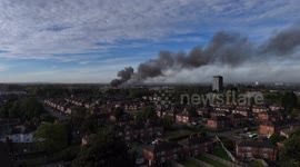Drone video reveals smoke billowing across city centre after a huge fire broke out