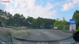 Car Driver Doesn't Stop at Roundabout