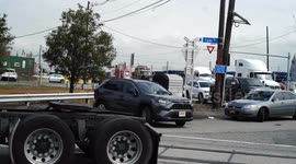 Over Two dozen Truckers drove past the Longshoremen’s Picket Line in Support of their strike