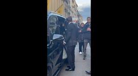 David Beckham helps wife Victoria out of car on crutches